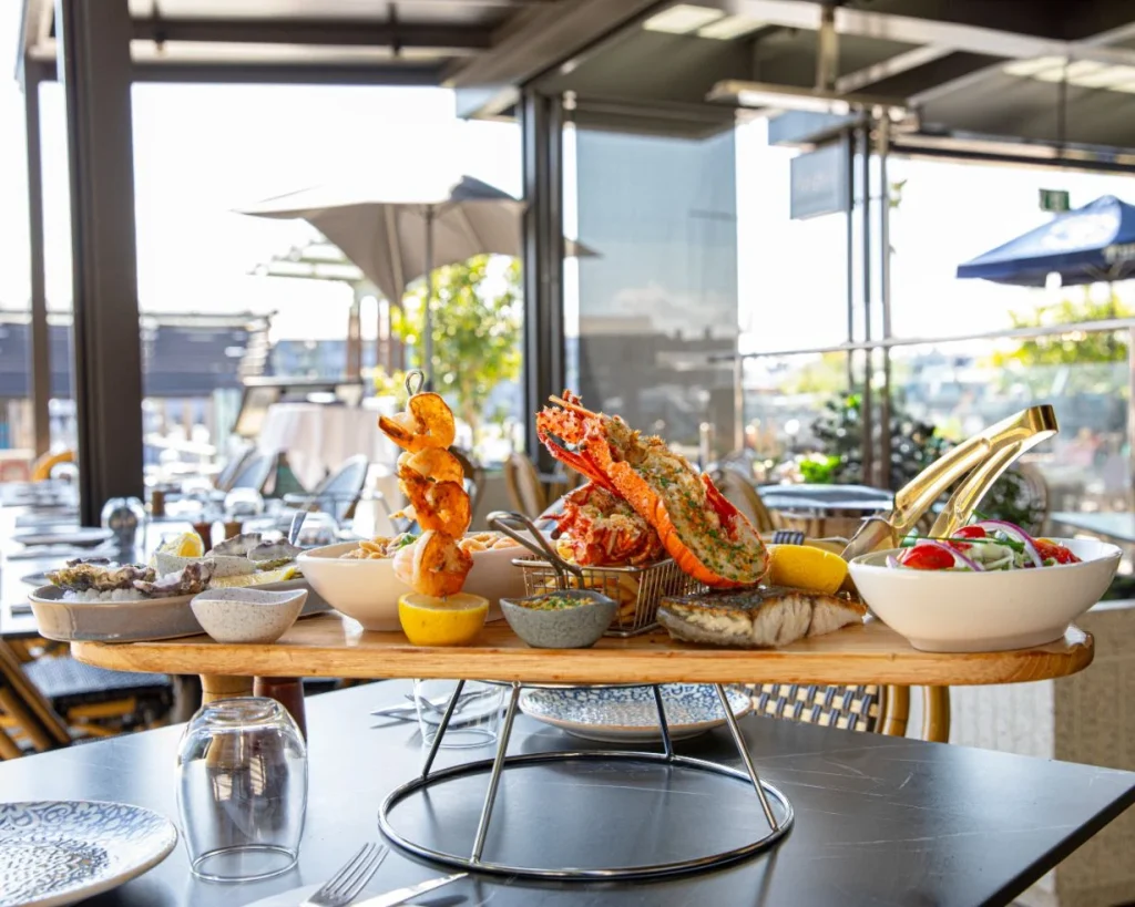 The Bistro 19 famous seafood platter on a board.